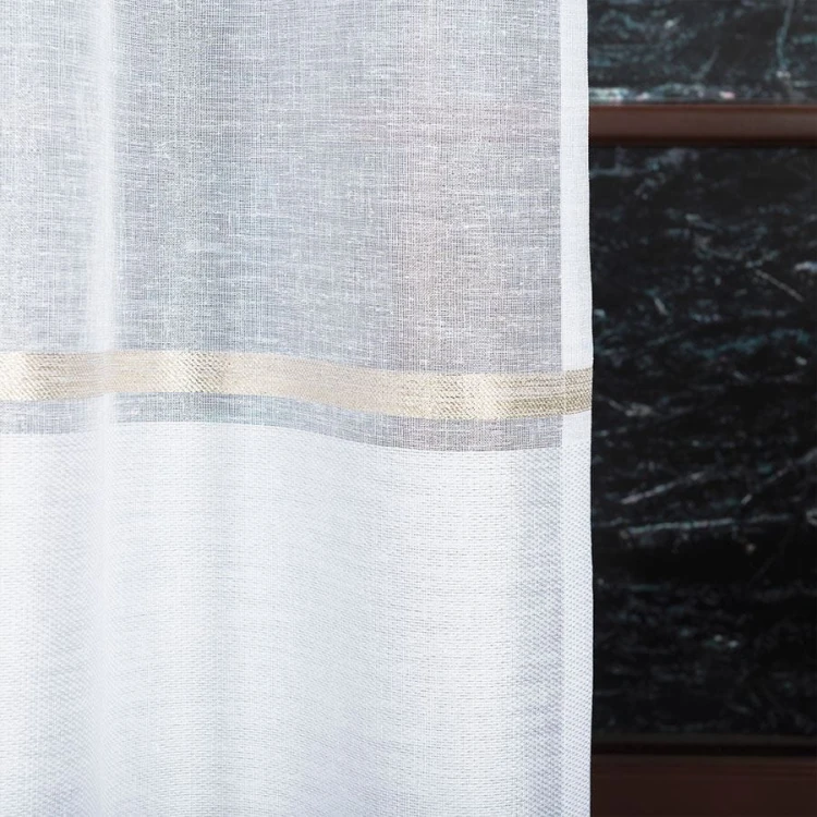 Firanka fantazyjna ze wzorem na samym dole z ołowianką, wysokość 330cm, kolor 003 biały ze złotym pasem